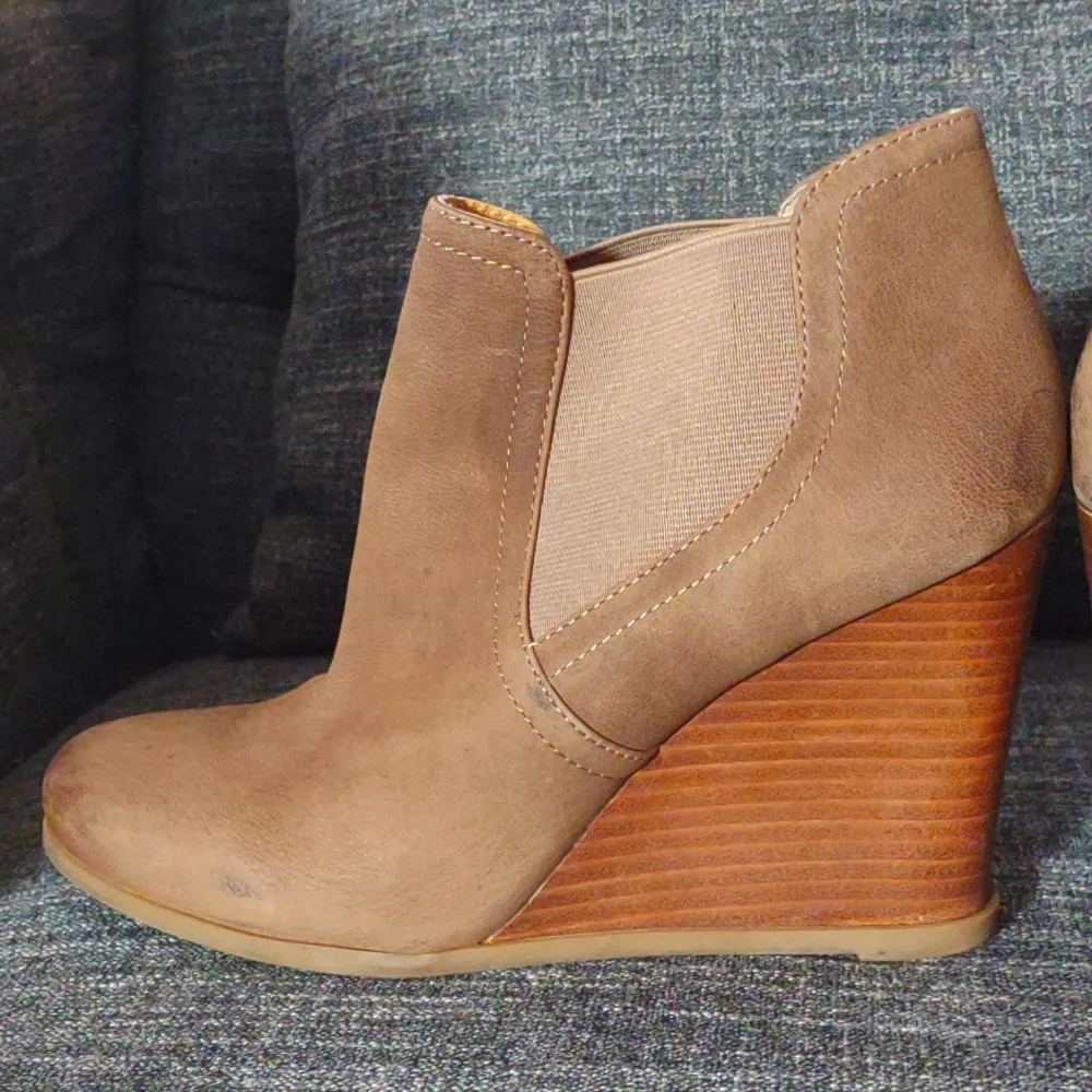 Audrey Brooke leather wedge booties.